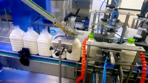 Milk pet bottle filling capping machine